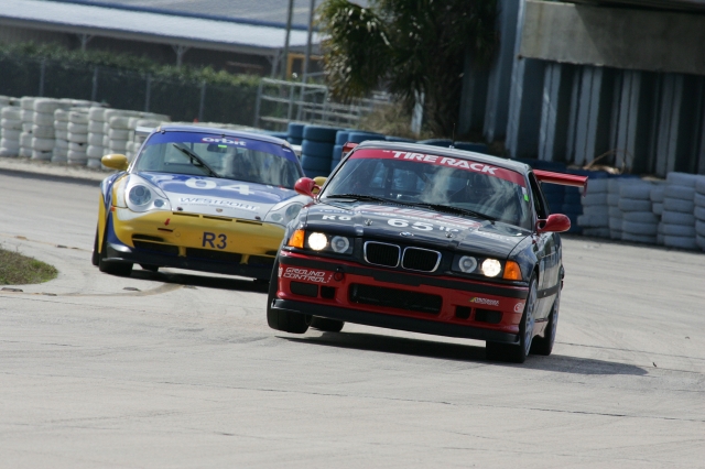 Sebring - I love battling with the Porsches. by Bruce Ashman